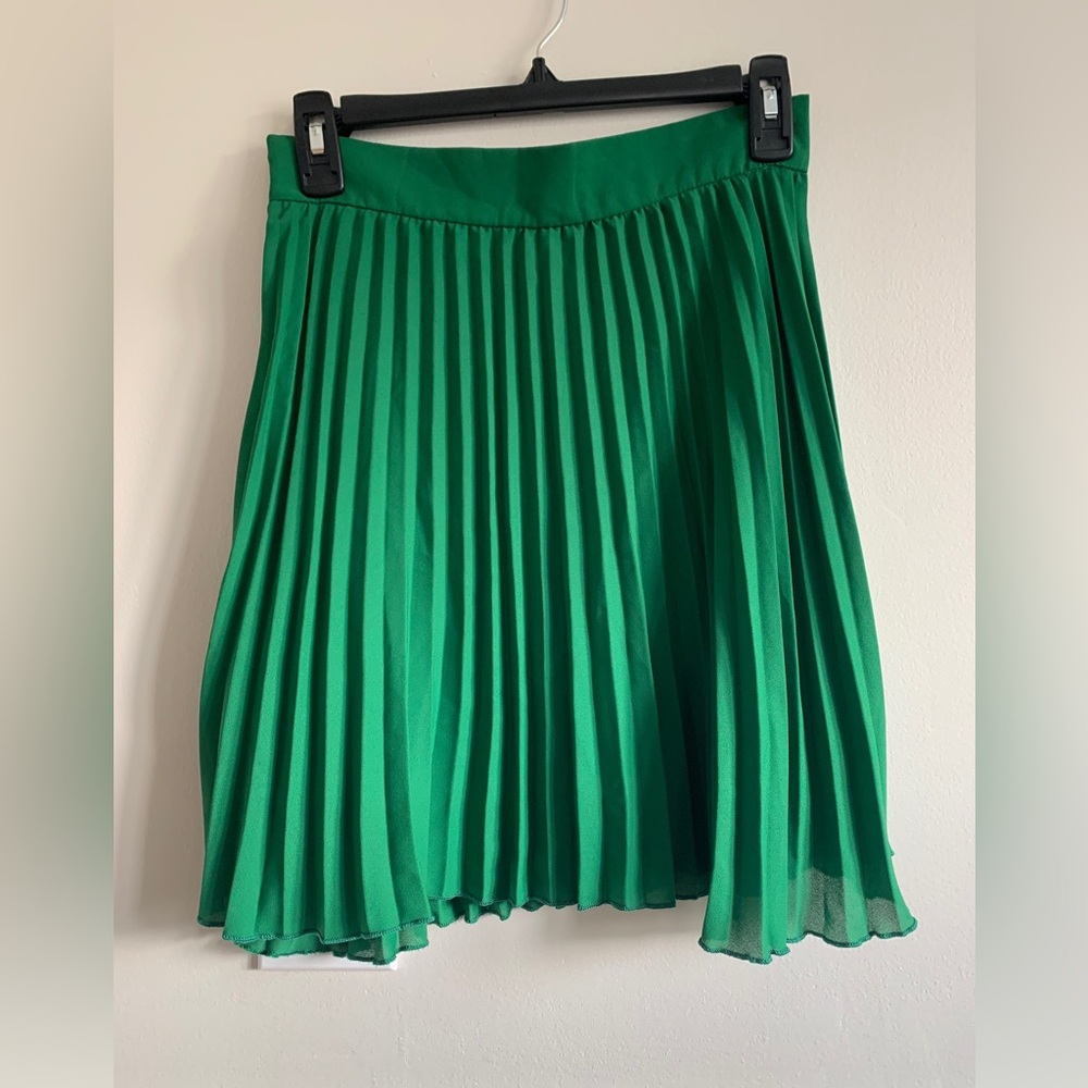 Green pleated skirt